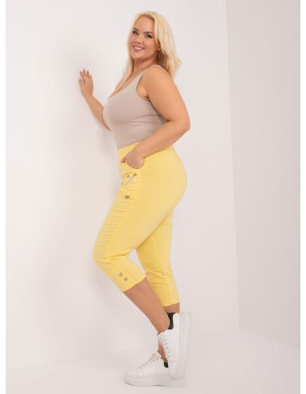 Levně Dámské kalhoty plus size 3/4 z látky KOTTA světle žluté